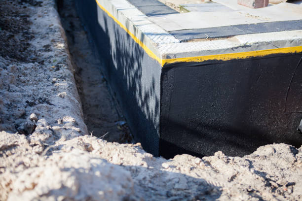 Professional Basement Waterproofing technician working in Greenfield, WI